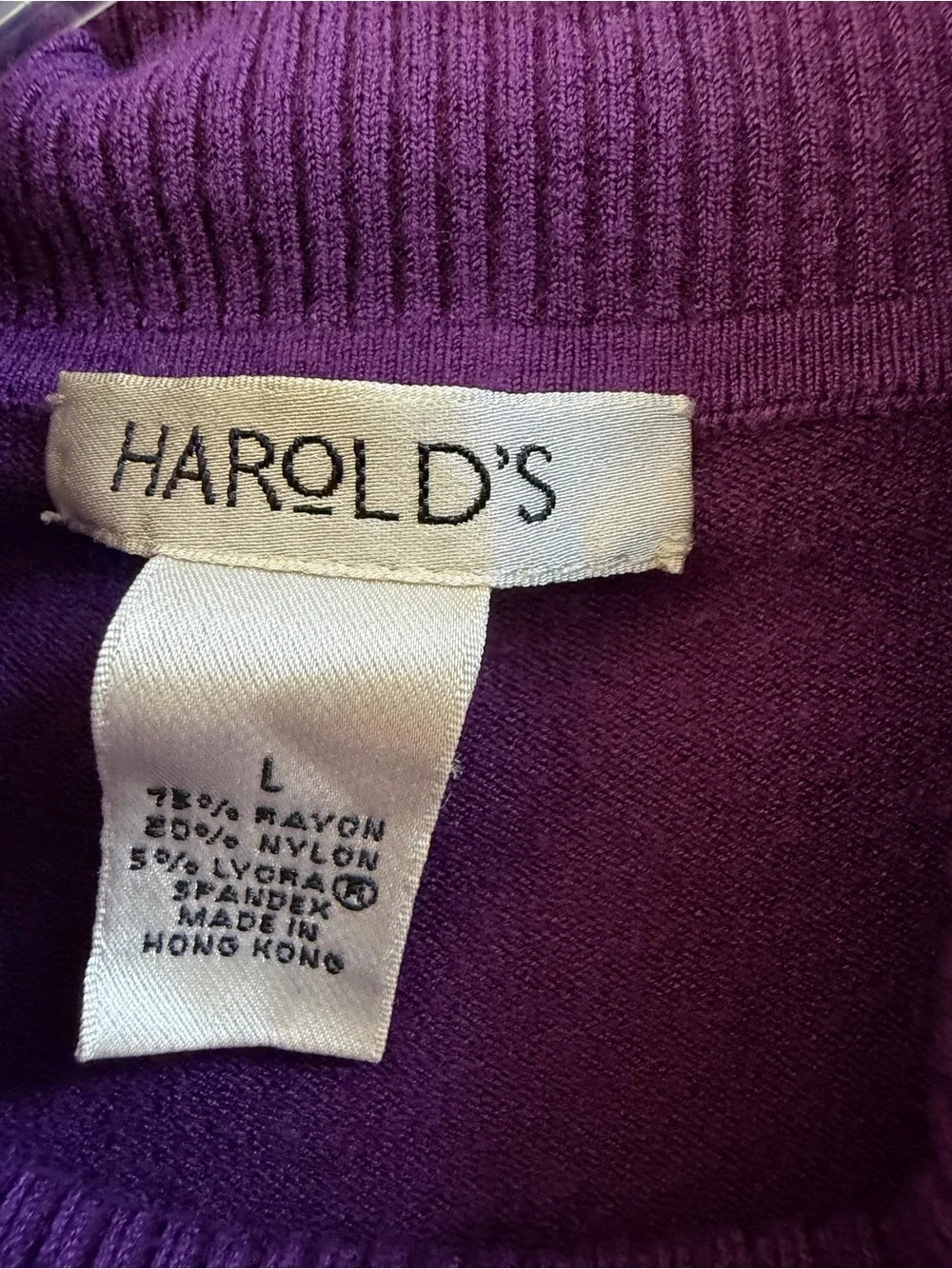 Harold’s purple turtleneck sweater